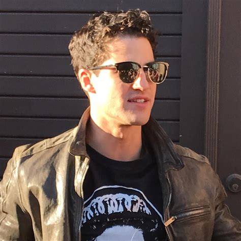 Darren Criss wears sunglasses .